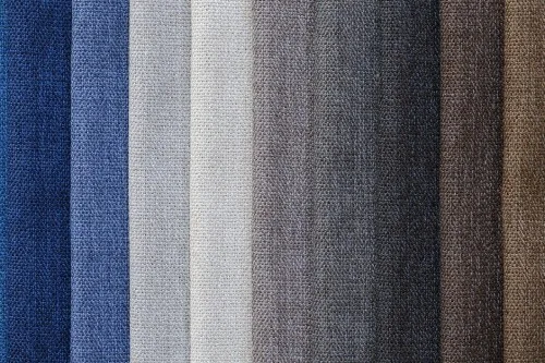 Blue, gray, beige, charcoal, and brown fabric swatches showing how to match colors in men’s clothing.