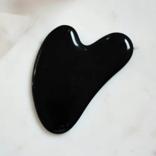 This one is subtle but important. Rest your tongue on the roof of your mouth. Teeth lightly touching. Breathe through your nose. Relax your jaw. Chronic mouth breathing changes facial tension. It keeps your jaw hanging and can contribute to that slack, open look. Proper tongue posture keeps the lower face engaged slightly. Is this a miracle? No. But when you combine posture, breathing, and fluid movement, your face looks more intentional. Less collapsed. And that’s the vibe.