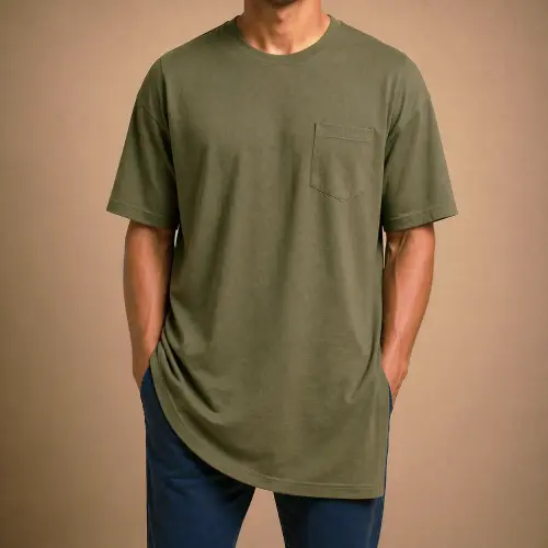 Man wearing an oversized green t-shirt with blue pants showing improper fit due to extra length
