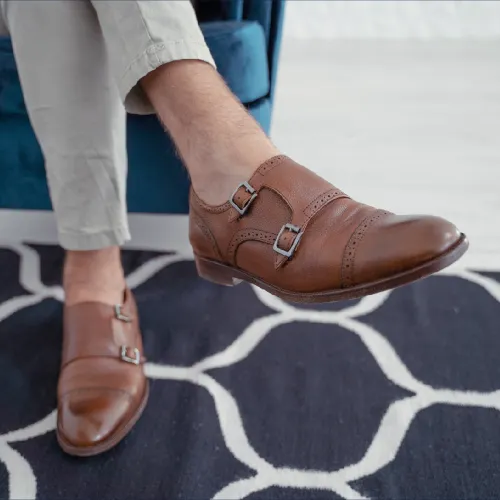 Brown double monk strap shoes shown among classic types of men's shoes.